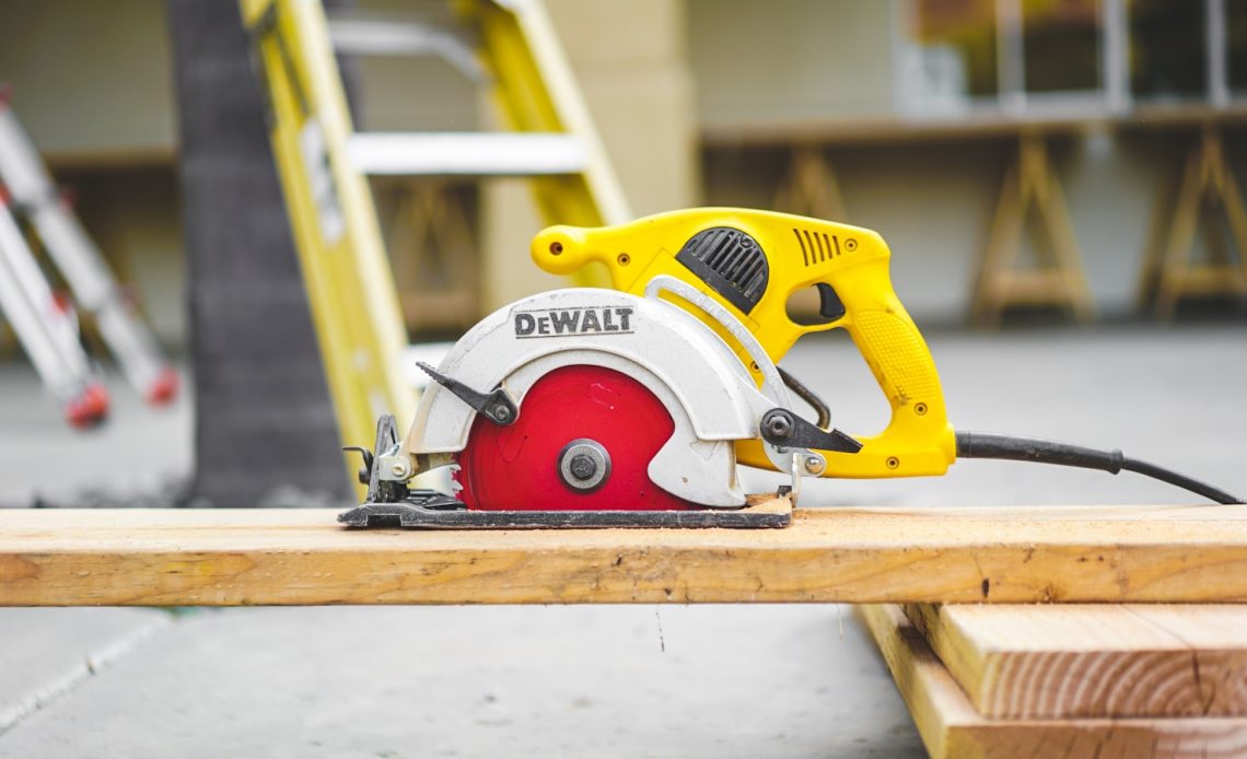 DEWALT finishing sander on wood